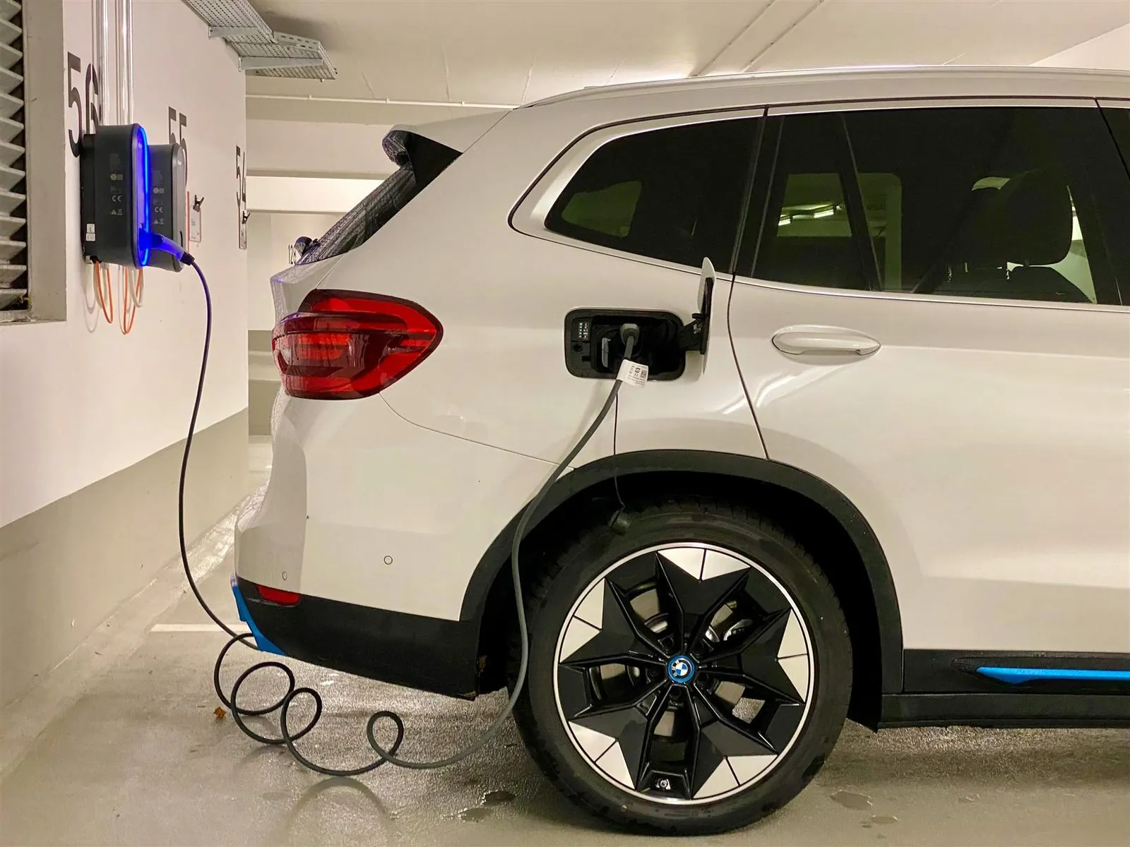 Home EV wall charger installed in a garage