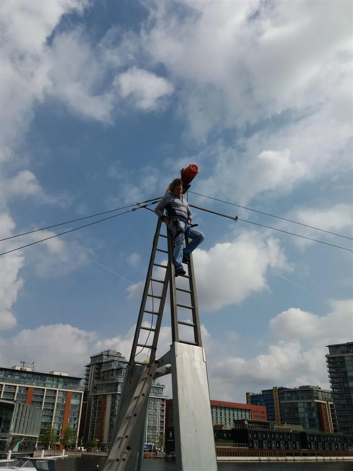 Electrician working at height in the Docklands