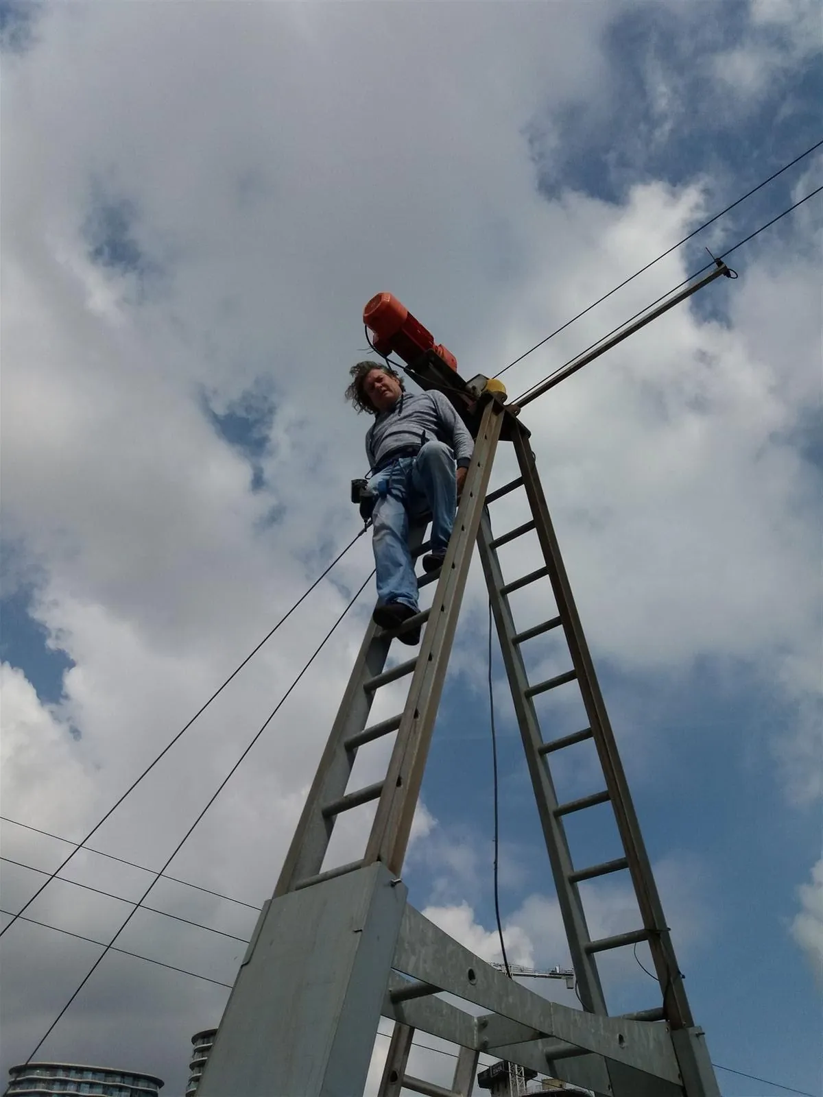 Electrician working at height in Wapping