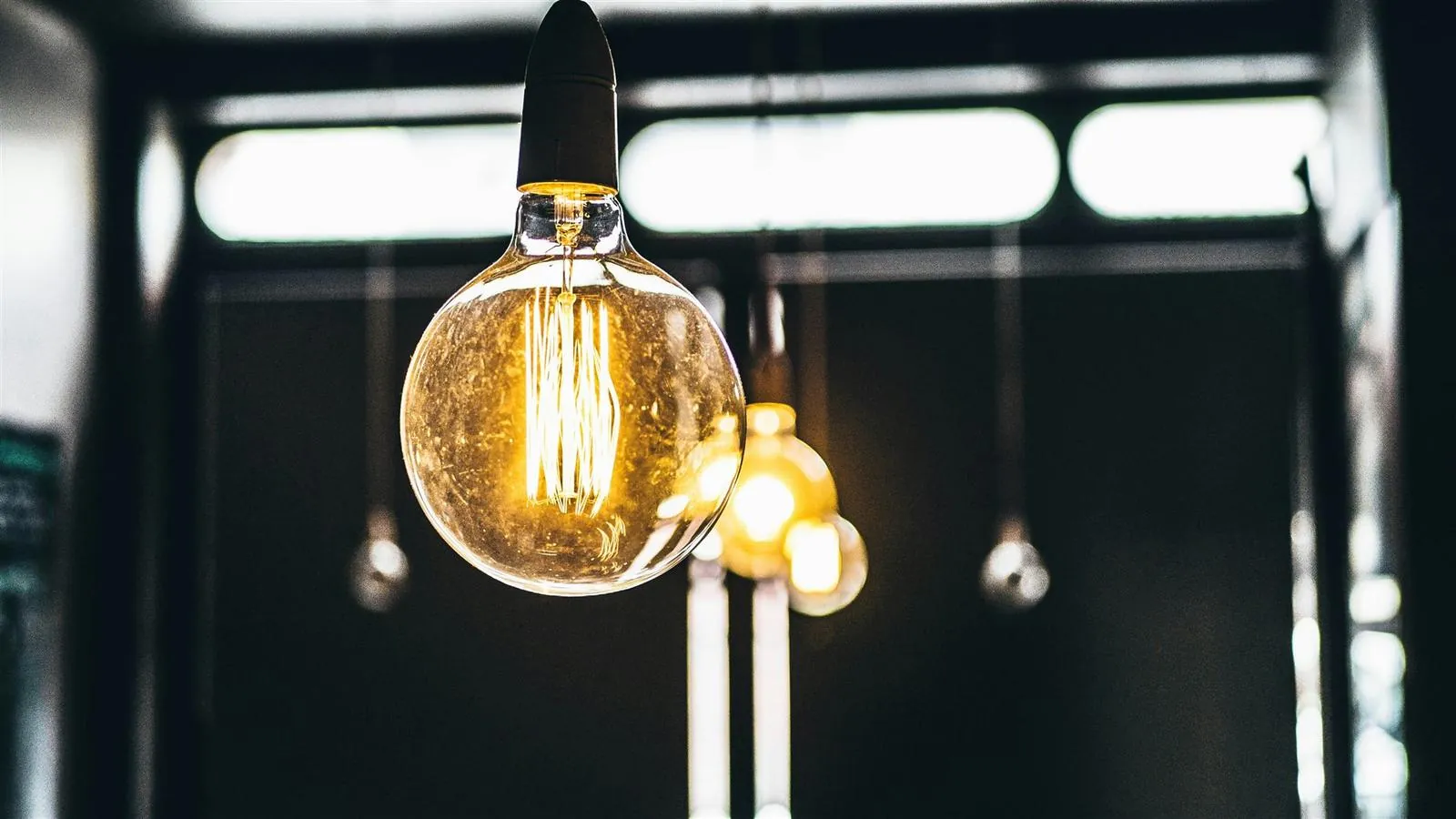 Vintage-style pendant bulbs installed