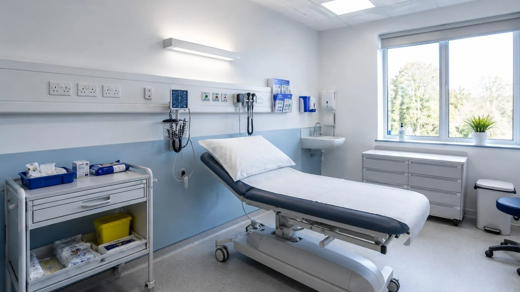 Clinical treatment room showing electrical sockets and switches
